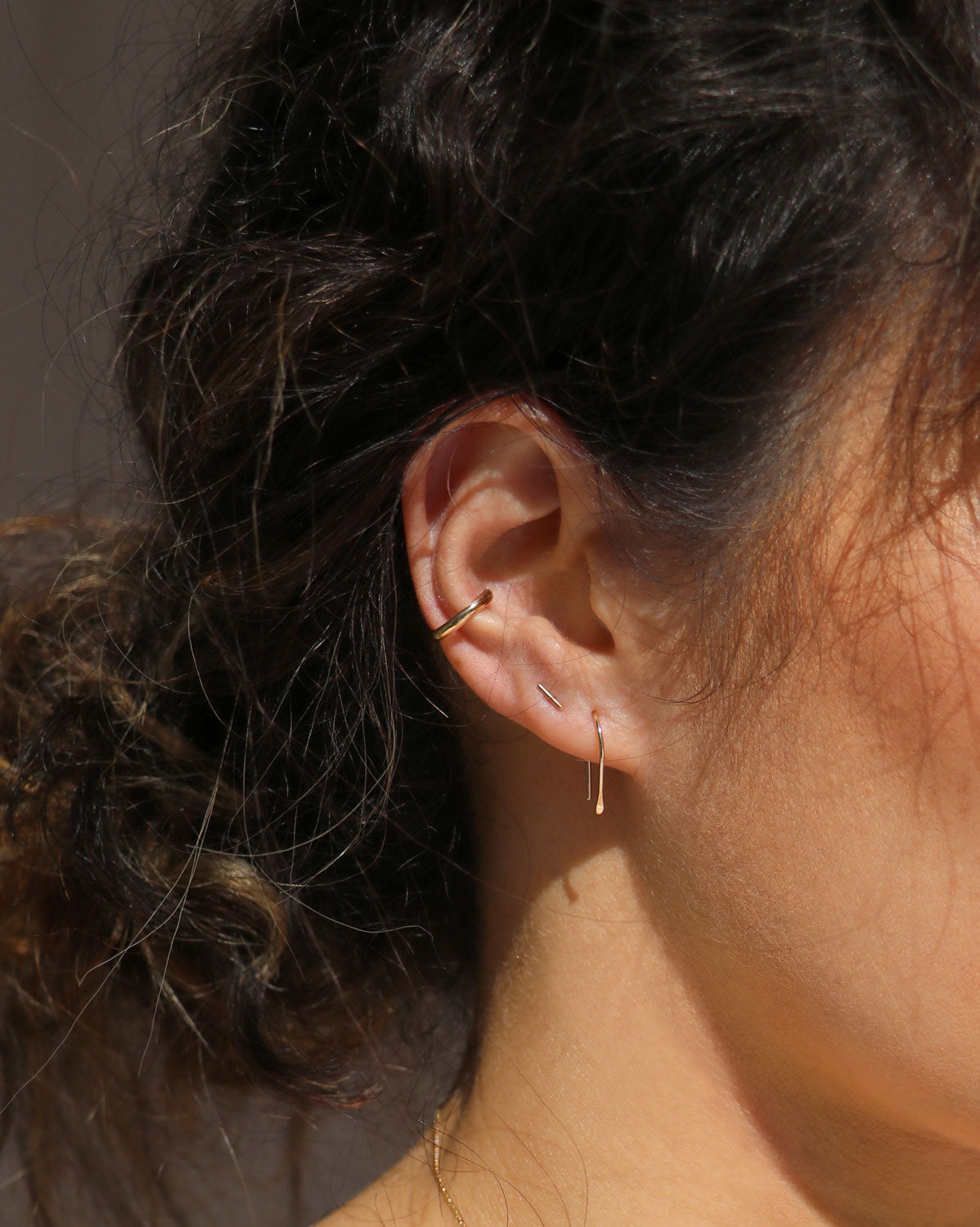 Pair of 9k arc earrings gold